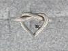 Click to see more information about this 'Love Knot Rings' item.